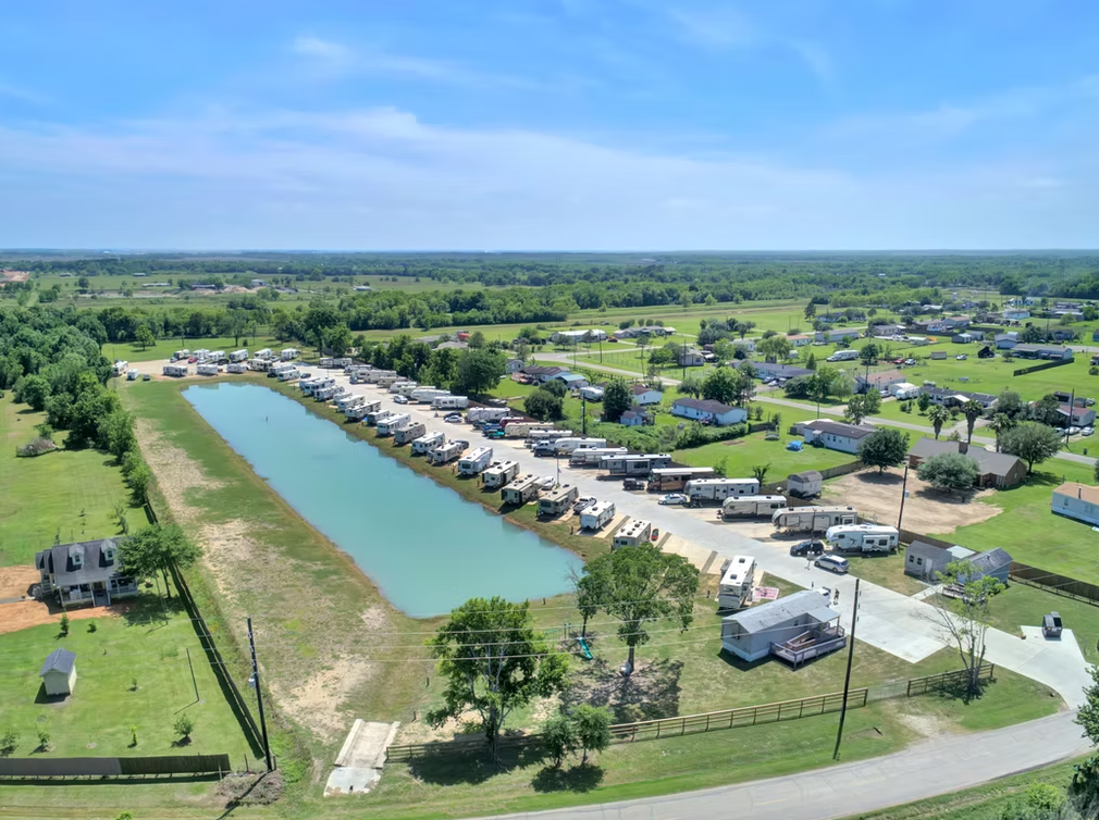 High aerial view of The Bend RV Park property